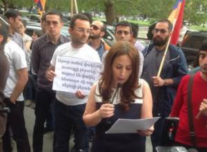 Round dance in front of the MES with “I am against”