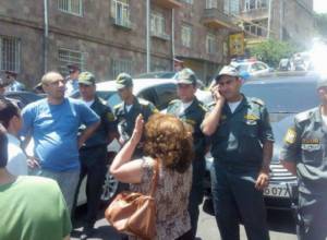 Police detain two activists protesting outside Public Services Regulatory Commission