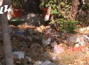 Children's park buried in trash