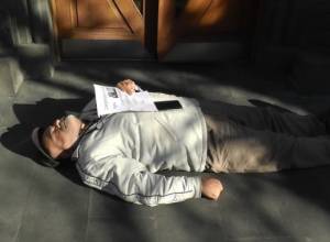 Vardes Gaspari holds a protest action at the State Revenue Committee Tax Service