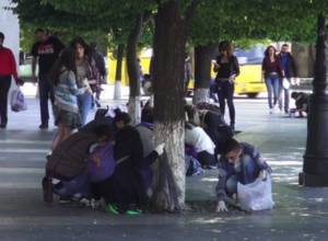 Protestors clean Republic Square