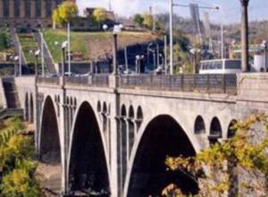 Resident thrown over bridge