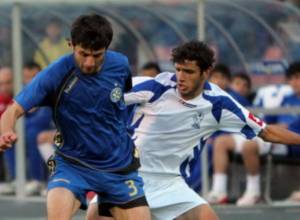 The coach congratulates their rival