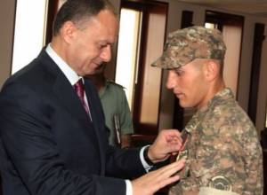 Servicemen awarded for saving their comrade-in-arms