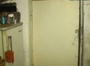 Woman and two children live on roof