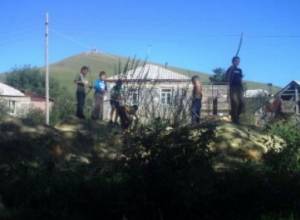 Children play in industrial wastes
