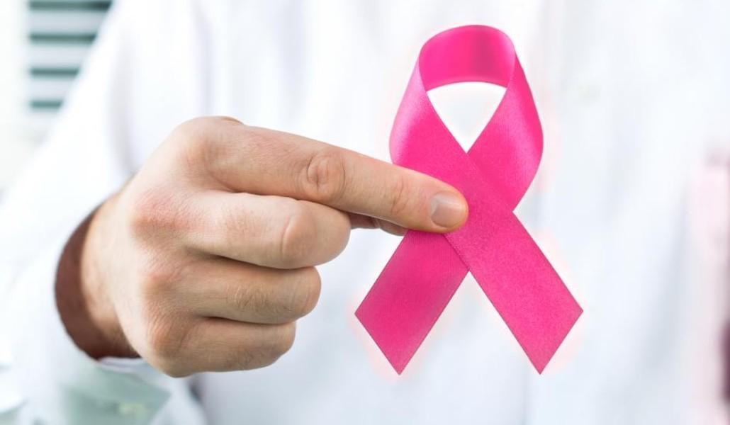 doctor-holding-breast-cancer-awareness-ribbon