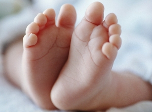 Единовременная денежная помощь выплачивающим ипотечный кредит семьям, у которых рождается ребенок