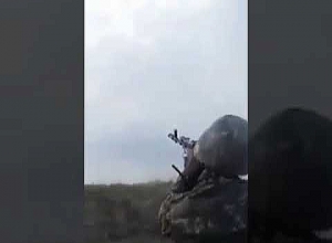 Armenian soldier hits enemy drone with rifle - video